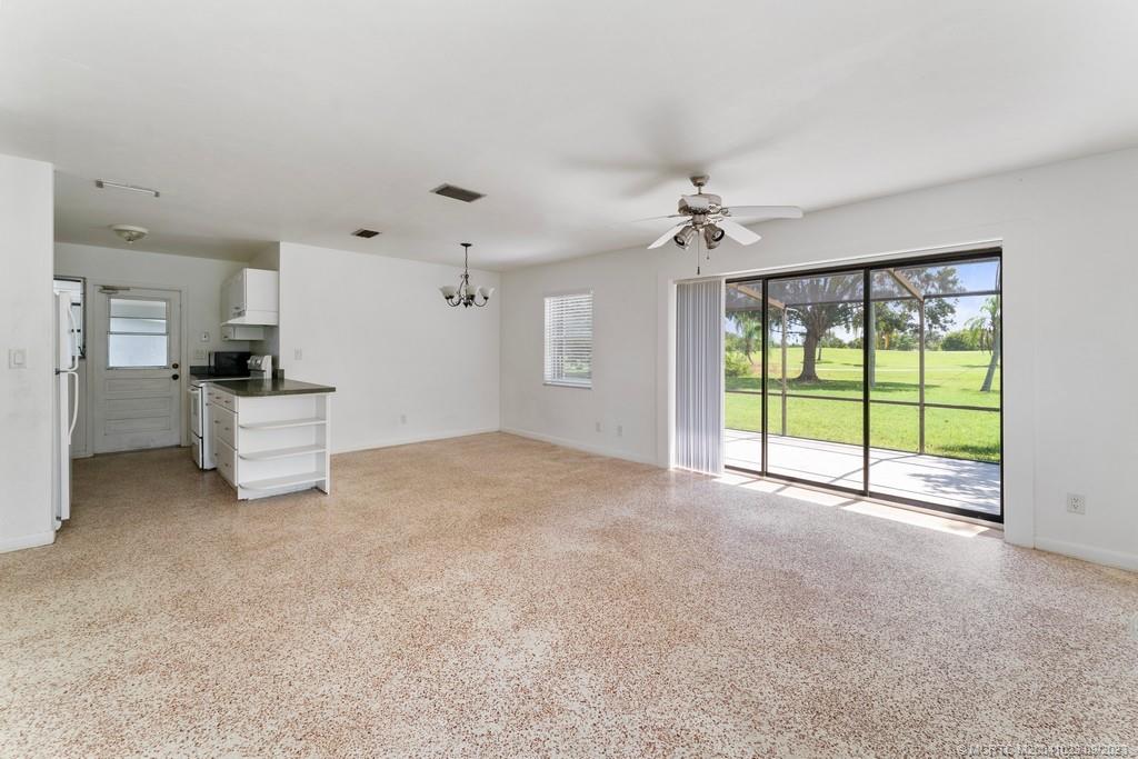2825 Southeast Pocatella Road Port St. Lucie, FL 34952 - Photo 7 of 36 a view of an empty room with a window
