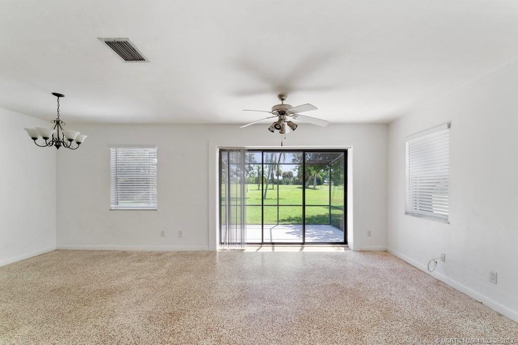 2825 Southeast Pocatella Road Port St. Lucie, FL 34952 - Photo 10 of 36 a view of an empty room with a window