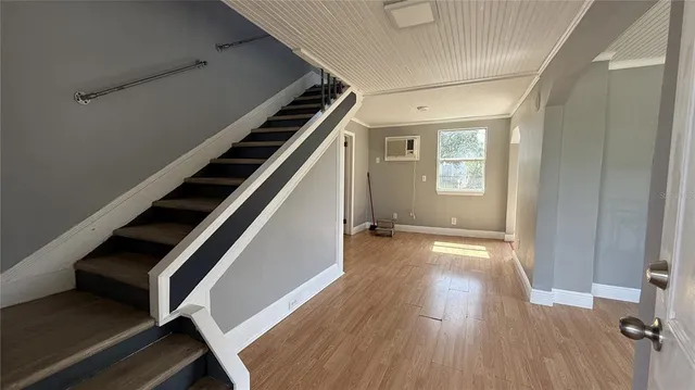 a kitchen with a sink stove and refrigerator