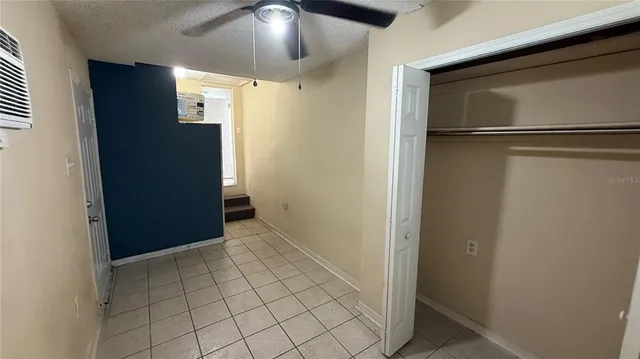 a bathroom with a shower and toilet
