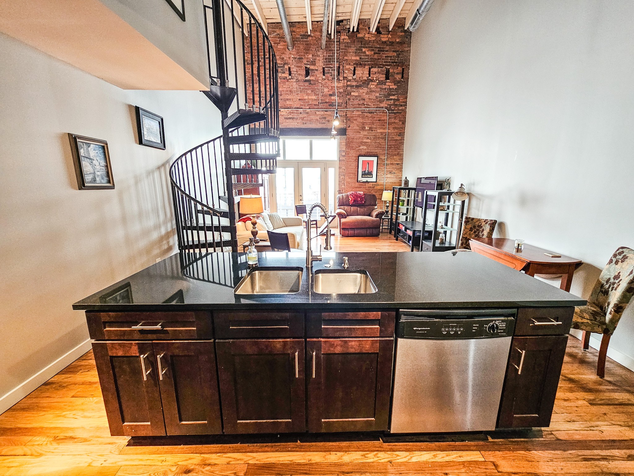 231 Rep. John Lewis Way North, Unit 406 Nashville, TN 37219 - Photo 15 of 30 a view of a dining room with furniture