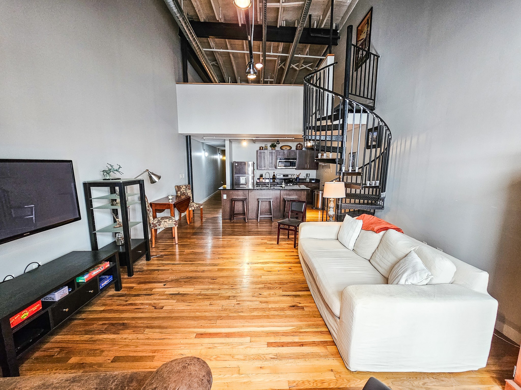231 Rep. John Lewis Way North, Unit 406 Nashville, TN 37219 - Photo 18 of 30 a view of living room and dining room with furniture