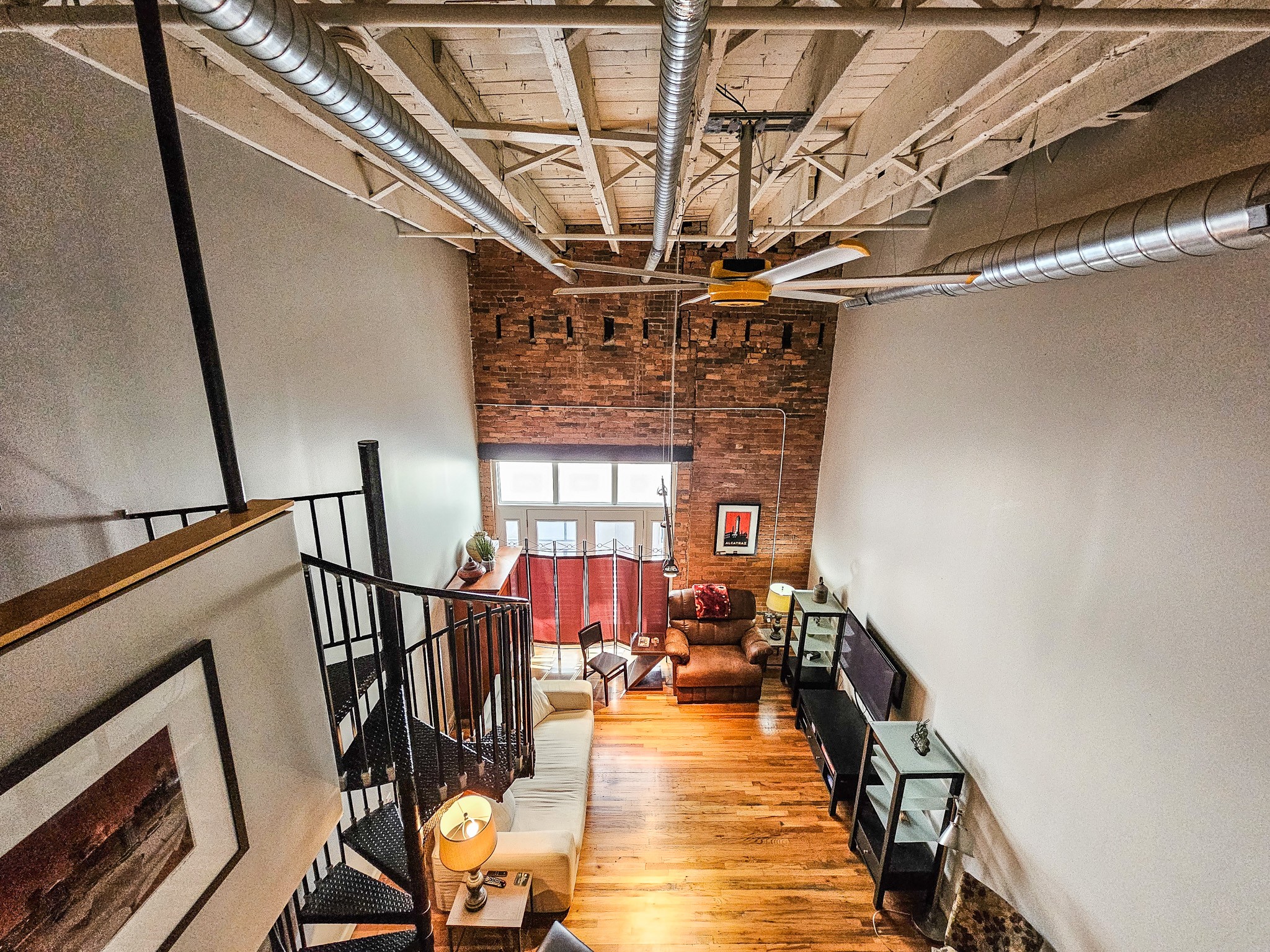231 Rep. John Lewis Way North, Unit 406 Nashville, TN 37219 - Photo 26 of 30 a view of a livingroom with wooden floor