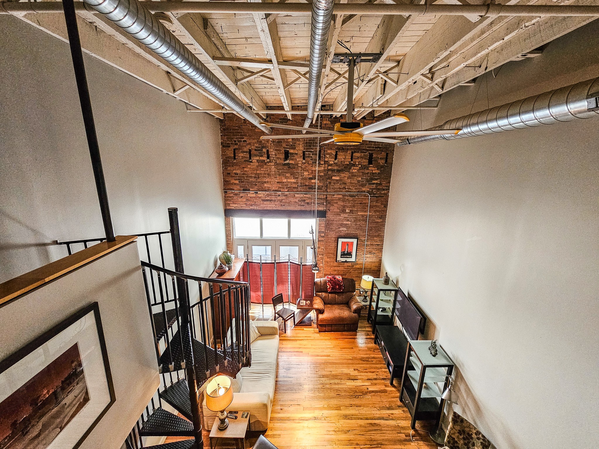231 Rep. John Lewis Way North, Unit 406 Nashville, TN 37219 - Photo 27 of 30 a view of a livingroom with wooden floor