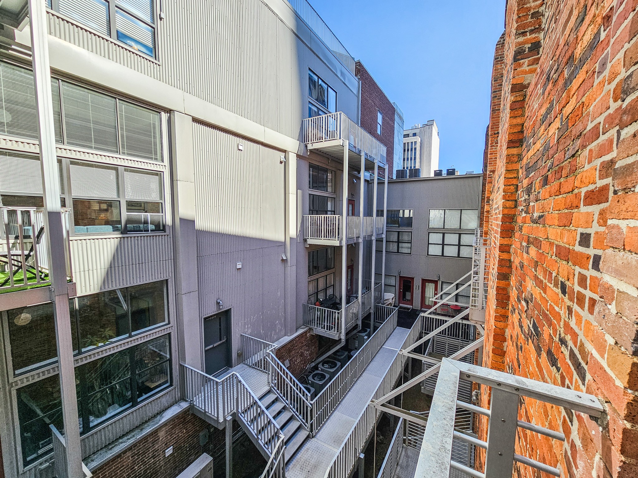 231 Rep. John Lewis Way North, Unit 406 Nashville, TN 37219 - Photo 29 of 30 front view of a building with a street