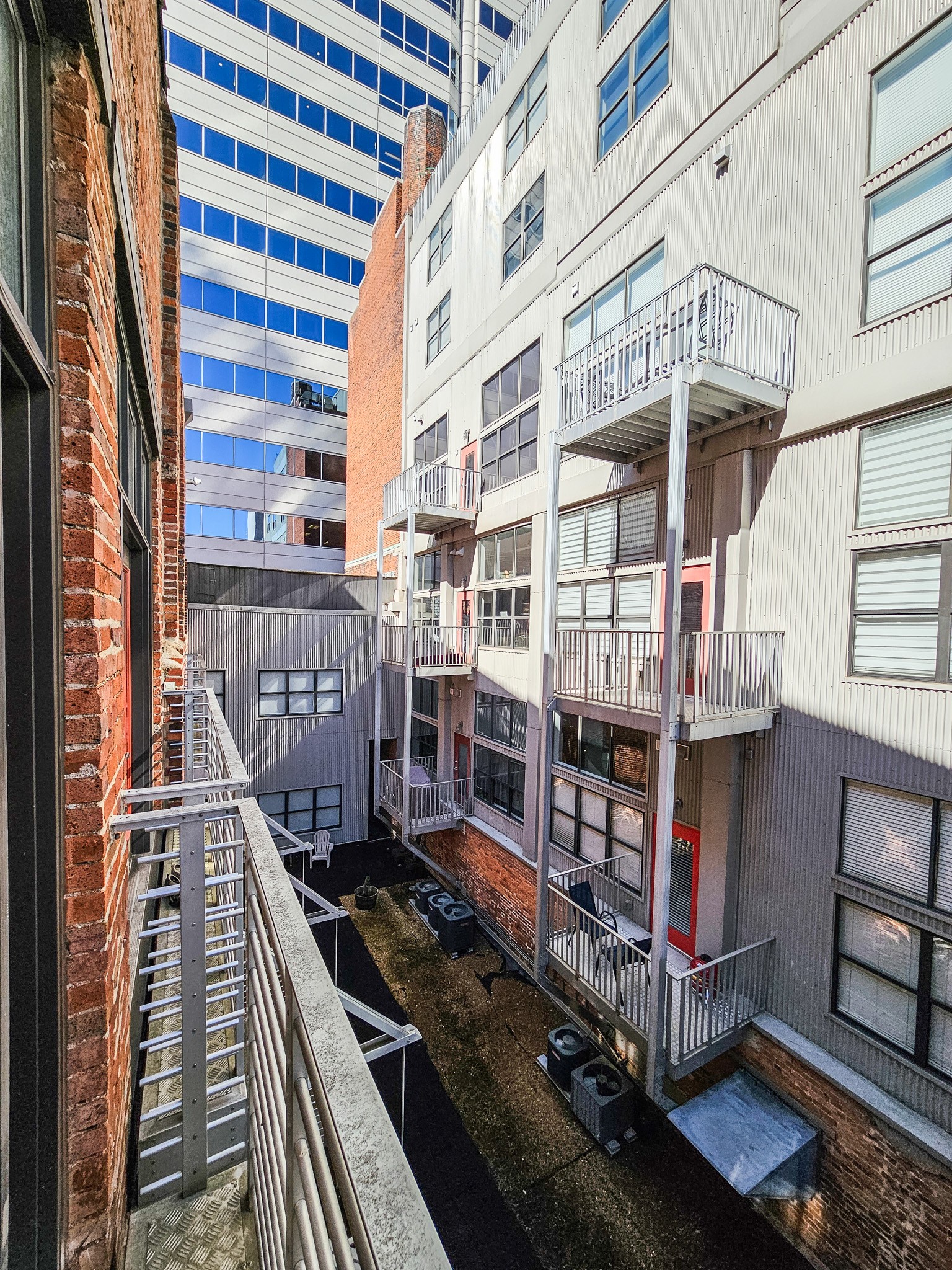 231 Rep. John Lewis Way North, Unit 406 Nashville, TN 37219 - Photo 30 of 30 a picture of a brick building with many windows