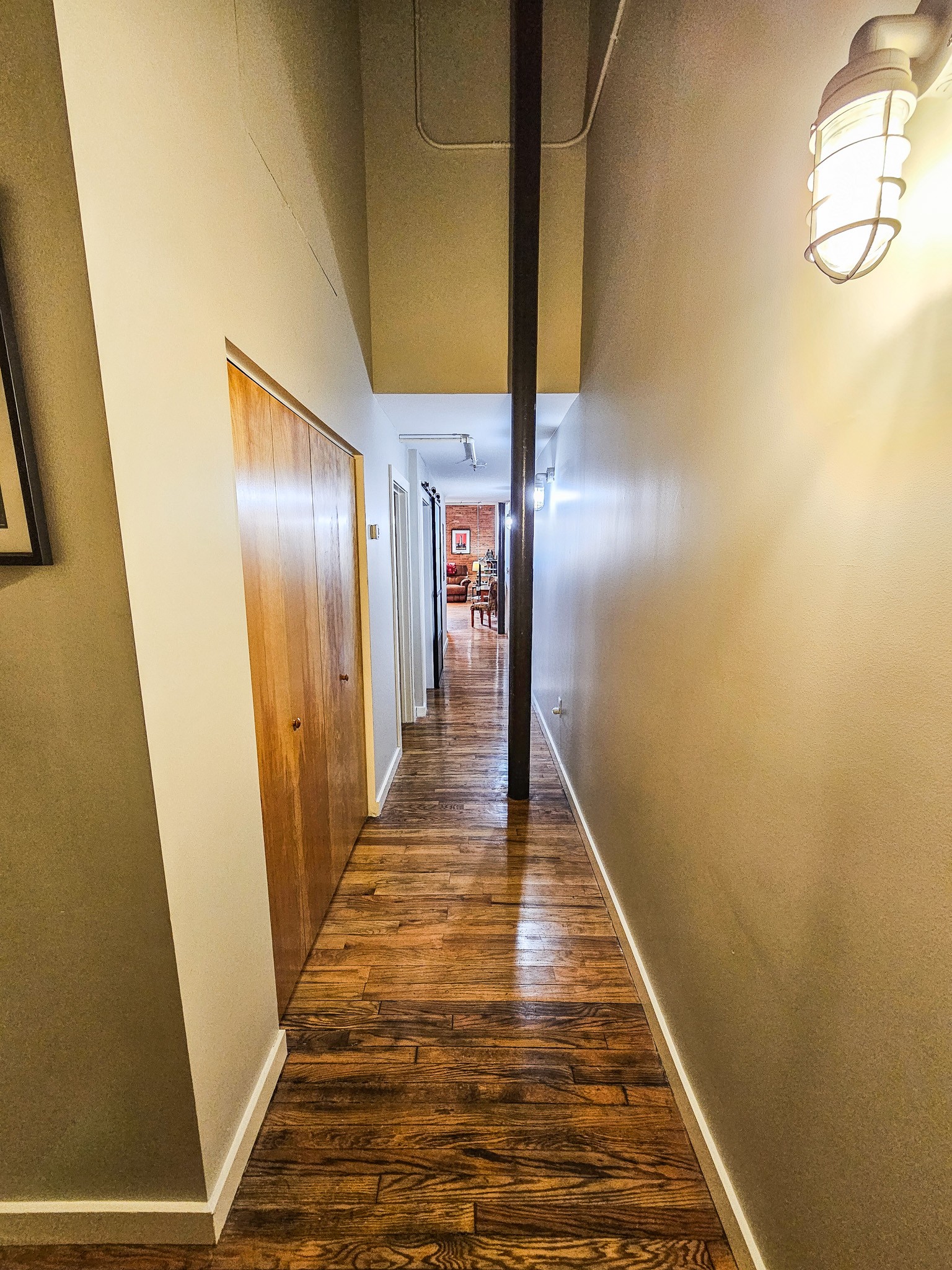 231 Rep. John Lewis Way North, Unit 406 Nashville, TN 37219 - Photo 7 of 30 a view of gallery with wooden floor