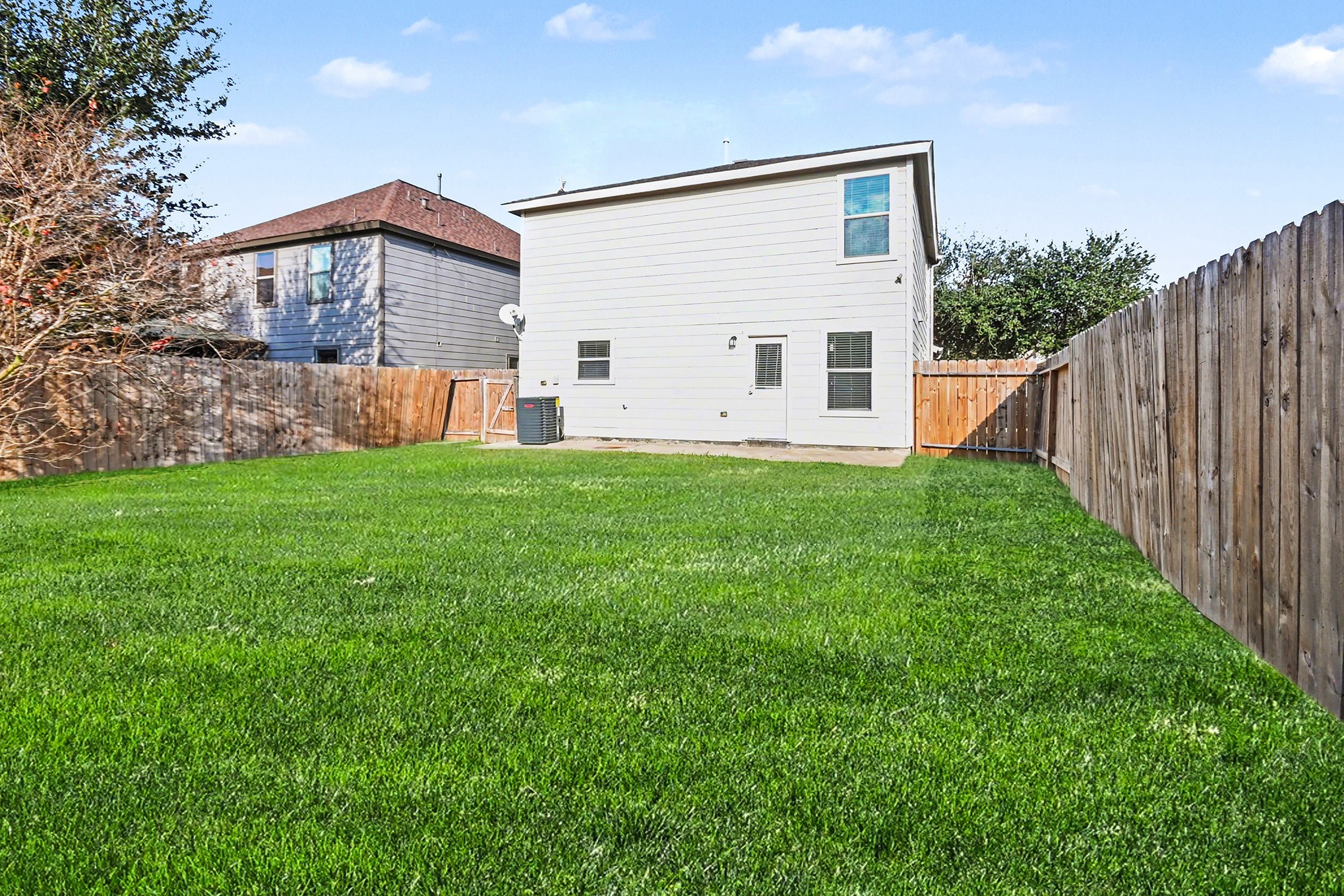 6703 Providence View Lane Houston, TX 77049 - Photo 13 of 21 a view of a house with backyard and garden