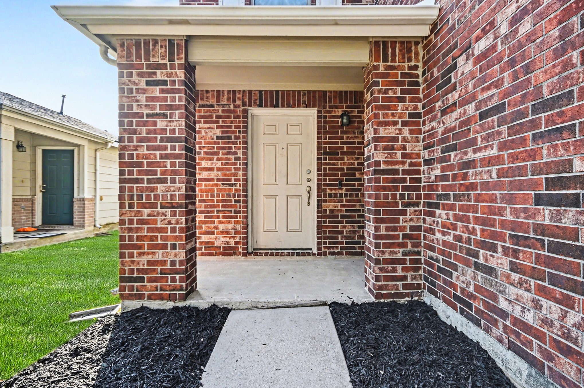 6703 Providence View Lane Houston, TX 77049 - Photo 16 of 21 a front view of a house with a garden