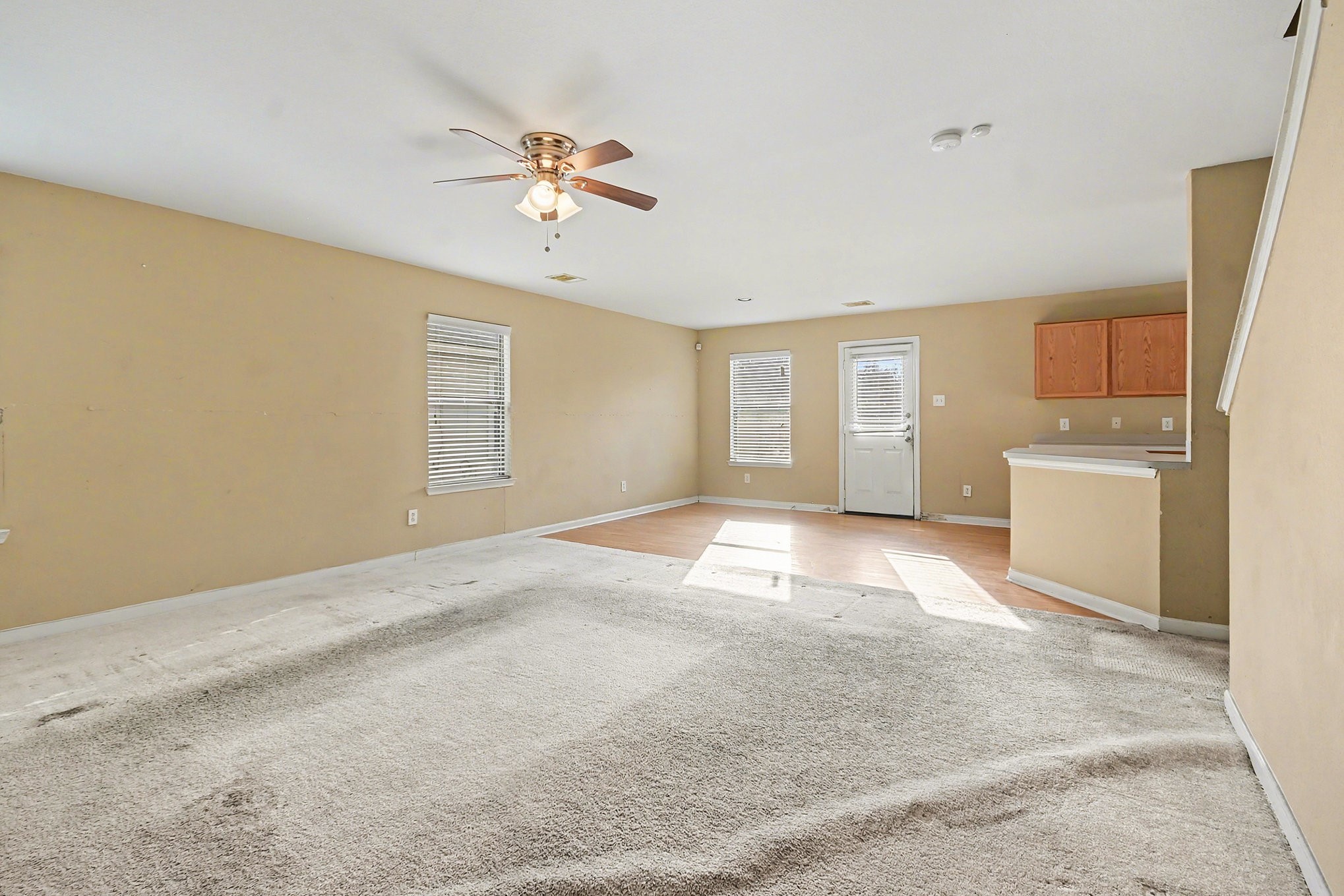 6703 Providence View Lane Houston, TX 77049 - Photo 3 of 21 a view of an empty room with a window