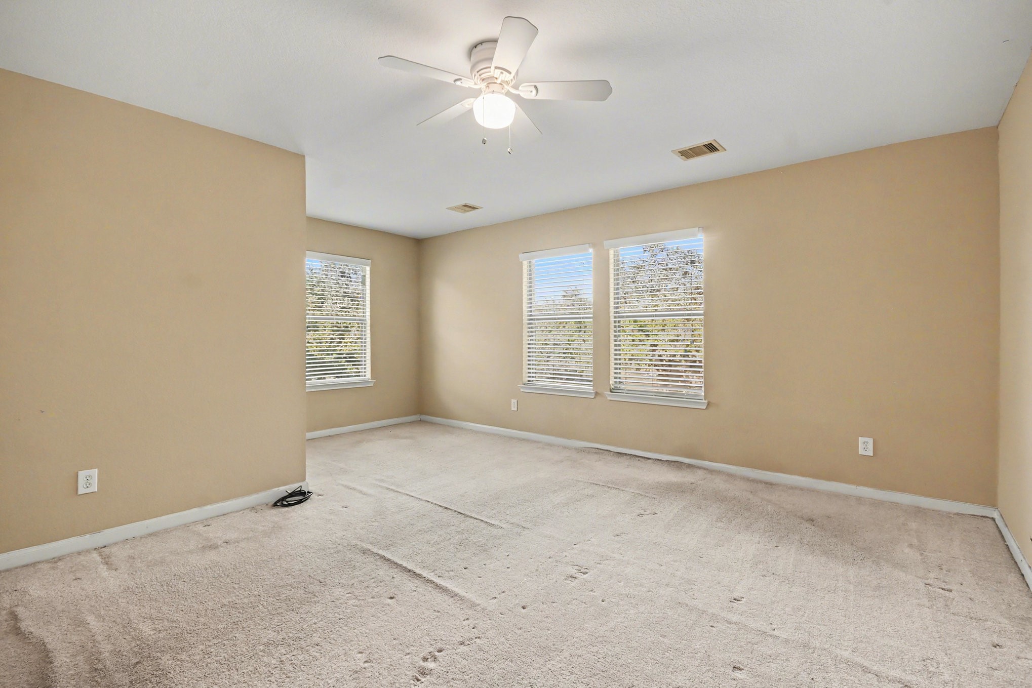 6703 Providence View Lane Houston, TX 77049 - Photo 9 of 21 a view of an empty room with a window