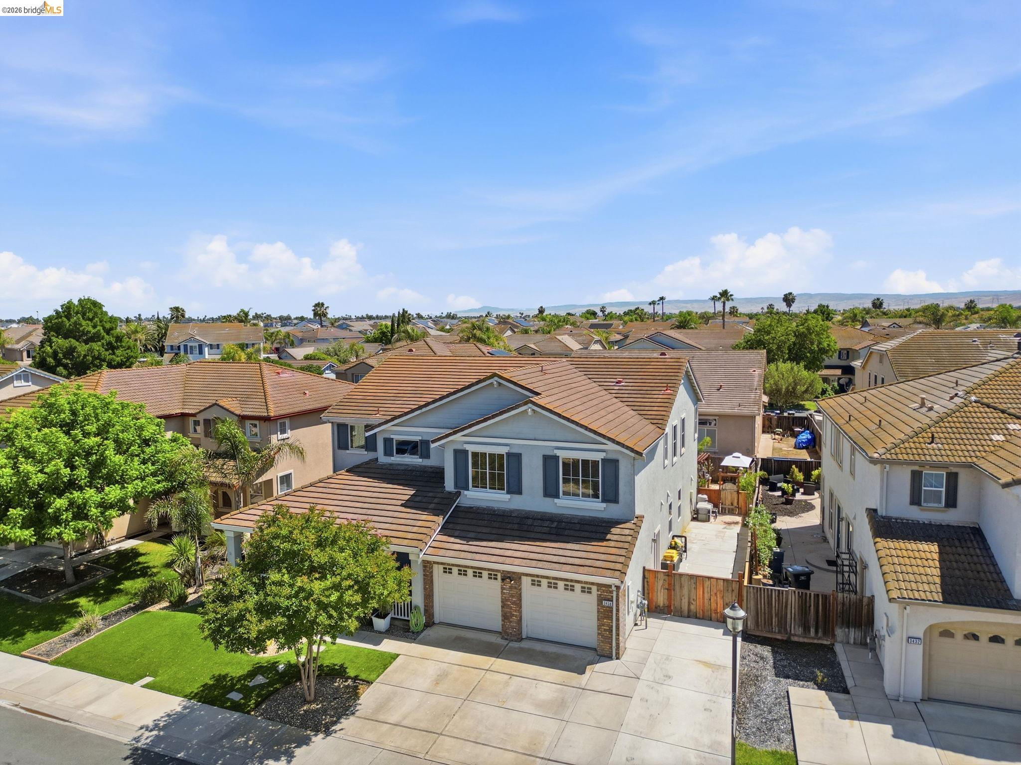 3438 Keystone Loop Discovery Bay, CA 94505 - Photo 49 of 57 a aerial view of a house with a yard and balcony