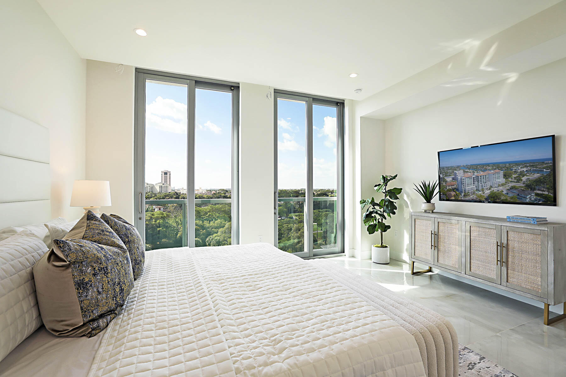 485 East Royal Palm Road, Unit 804 Boca Raton, FL 33432 - Photo 23 of 50 a bedroom with a large bed and a large window