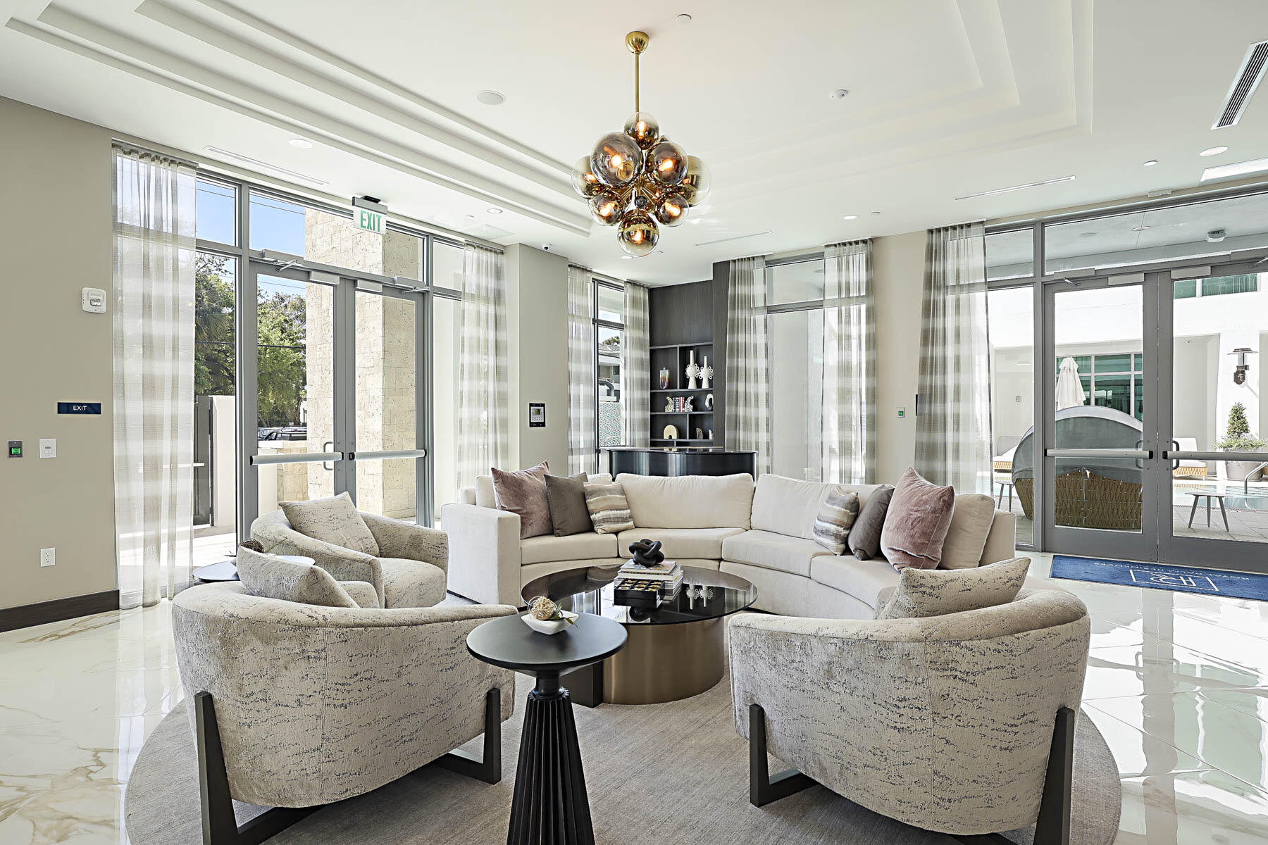 485 East Royal Palm Road, Unit 804 Boca Raton, FL 33432 - Photo 40 of 50 a living room with furniture and floor to ceiling windows