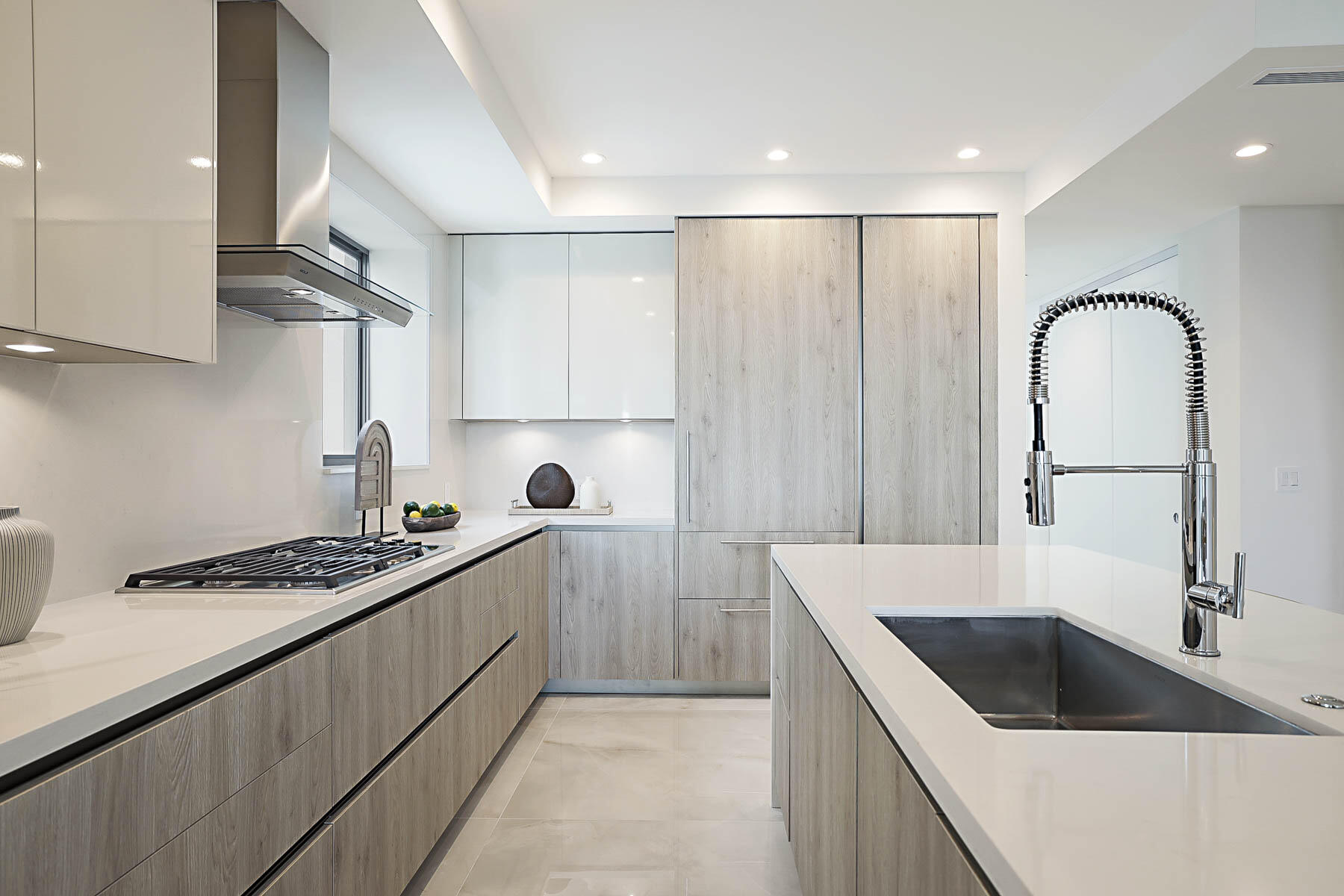 485 East Royal Palm Road, Unit 804 Boca Raton, FL 33432 - Photo 9 of 50 a kitchen with a sink and cabinets