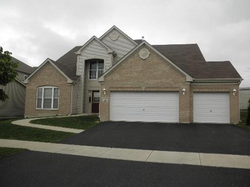 296 Stonegate Road Bolingbrook, IL 60440 - Photo 1 of 1 a front view of a house with a yard