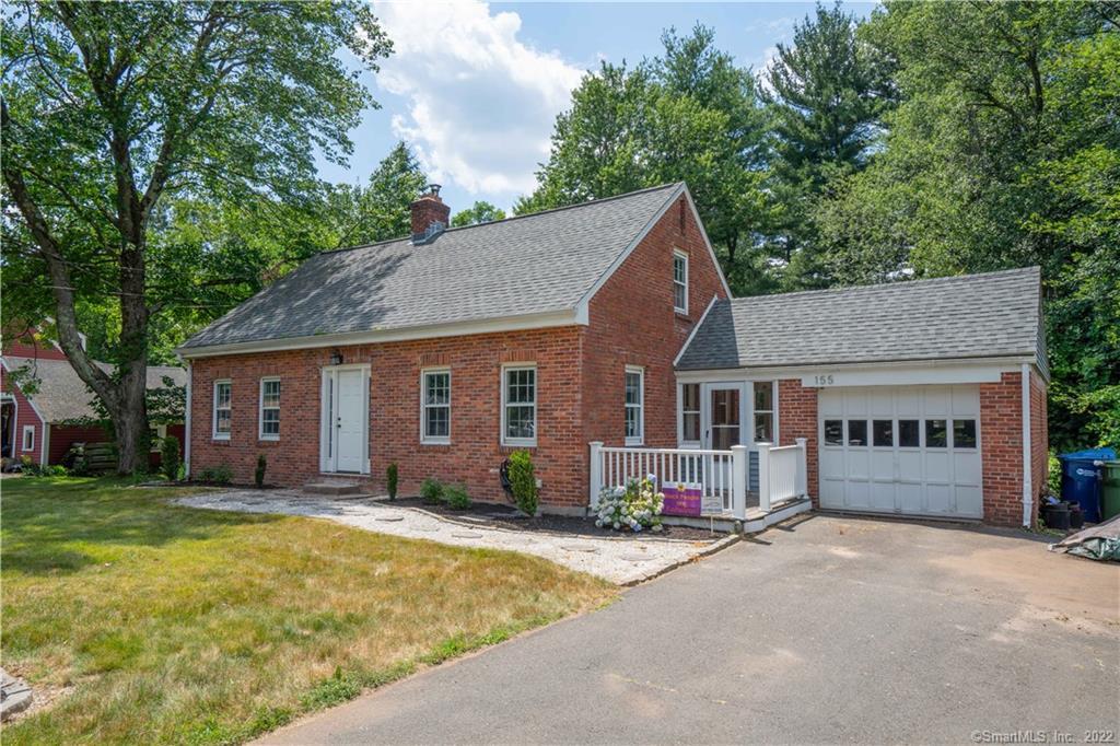 155 Mountain Road Windsor, CT 06095 - Photo 1 of 1 a view of a house with a yard plants and large tree