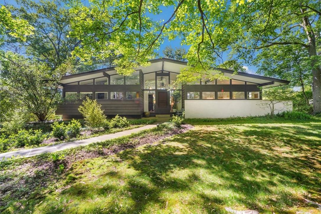 424 North Ridge Street Rye Brook, NY 10573 - Photo 1 of 1 front view of a house with a yard