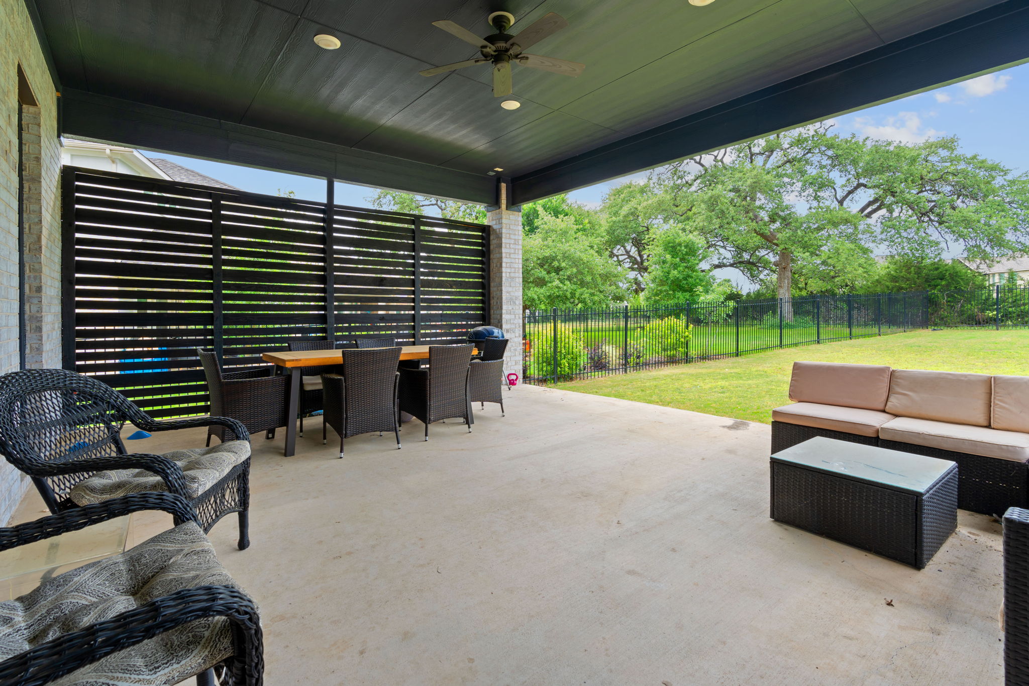 309 Pear Tree Lane Austin, TX 78737 - Photo 37 of 39 a view of a patio with a yard