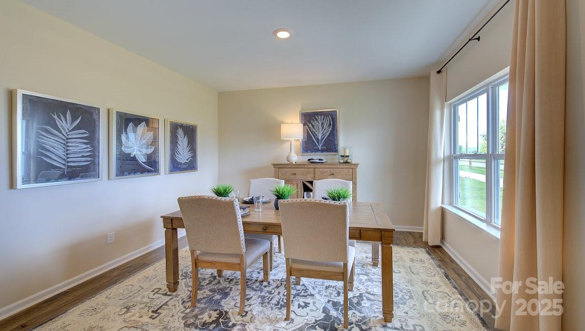 145 Bovine Br Road Fletcher, NC 28732 - Photo 12 of 43 a dining room with furniture and window