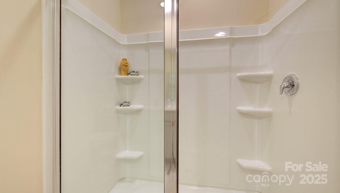 145 Bovine Br Road Fletcher, NC 28732 - Photo 19 of 43 a bathroom with a shower