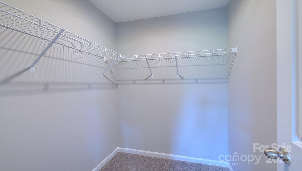 145 Bovine Br Road Fletcher, NC 28732 - Photo 30 of 43 a view of a room with racks on the wall