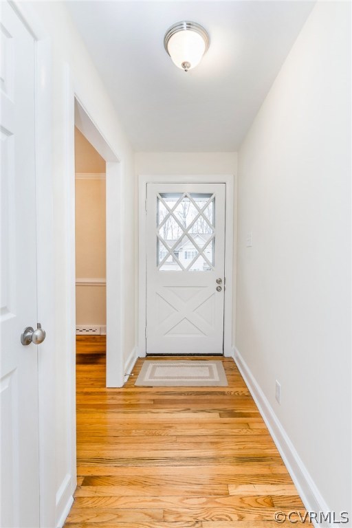 9604 Meadowview Road Richmond, VA 23294 - Photo 5 of 32 a view of an empty room with wooden floor and a window