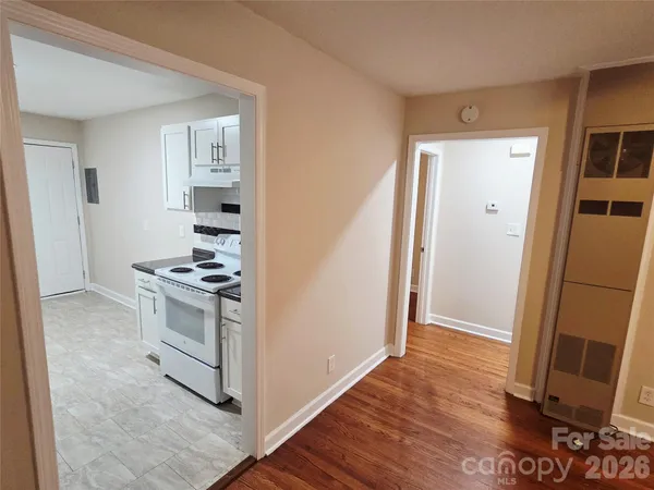 a view of kitchen and wooden floor