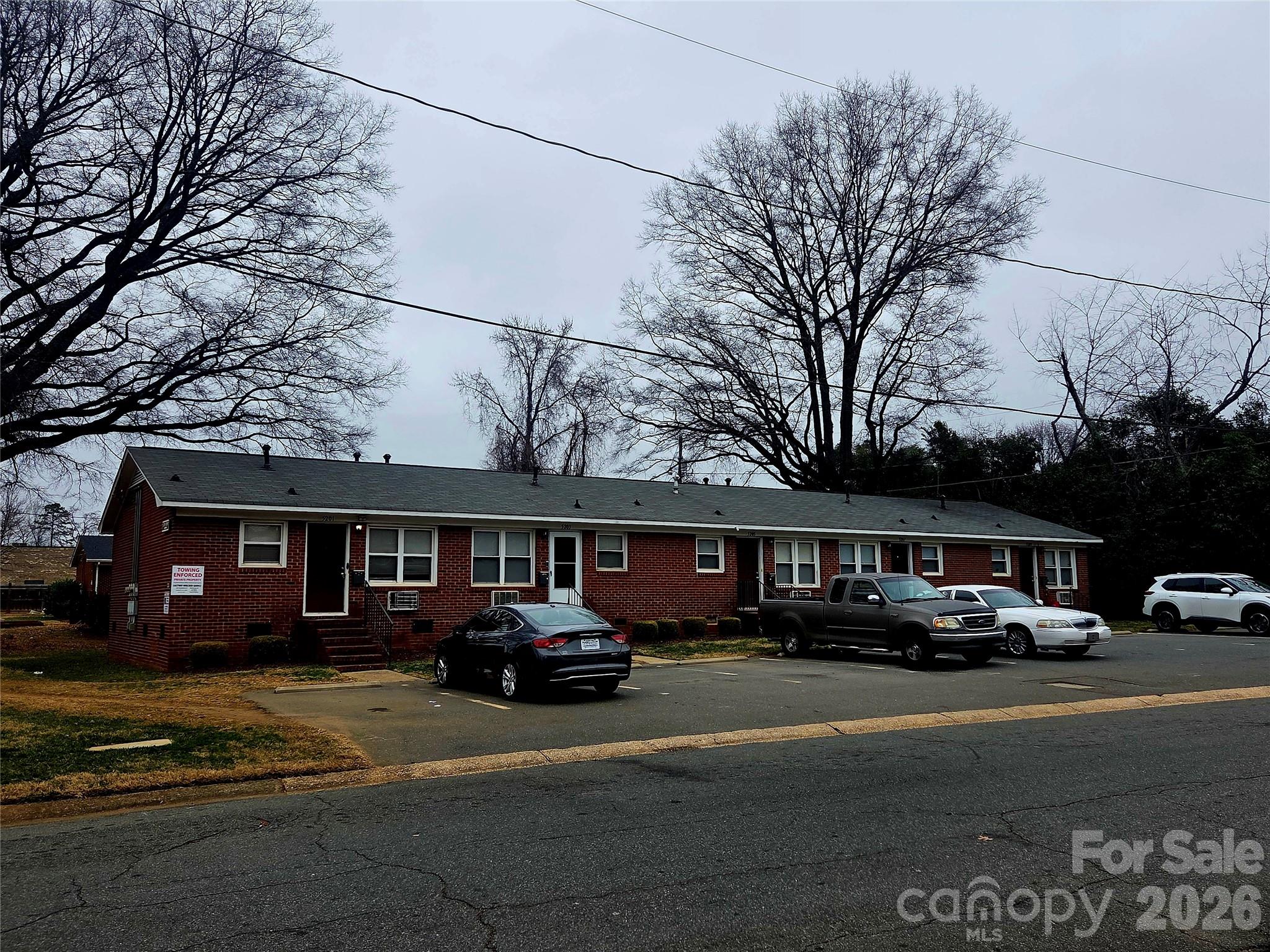 3500 North Sharon Amity Road Charlotte, NC 28212 - Photo 15 of 16 a car parked in front of houses