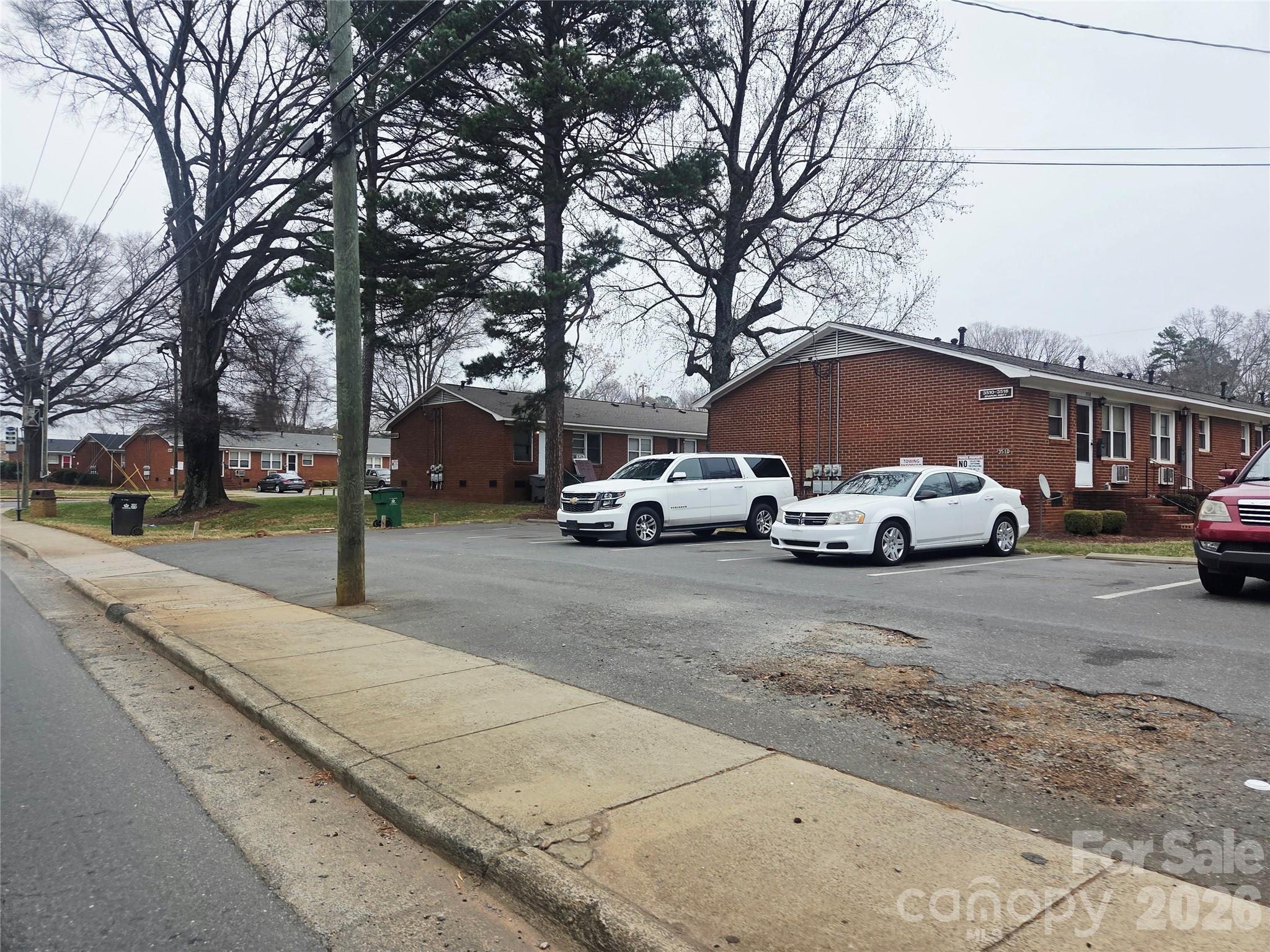 3500 North Sharon Amity Road Charlotte, NC 28212 - Photo 16 of 16 a car parked on the side of a street