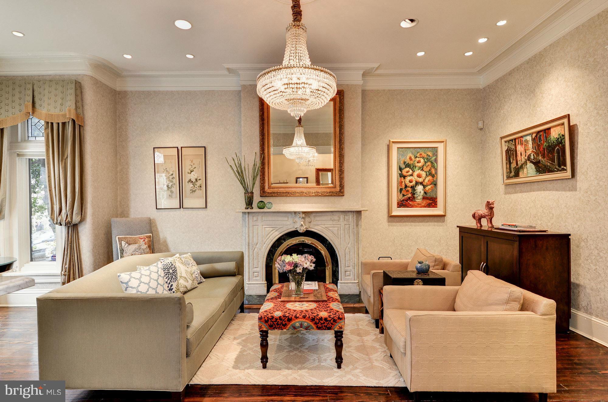 1733 Q Street Northwest Washington, DC 20009 - Photo 3 of 15 a living room with furniture and a large window