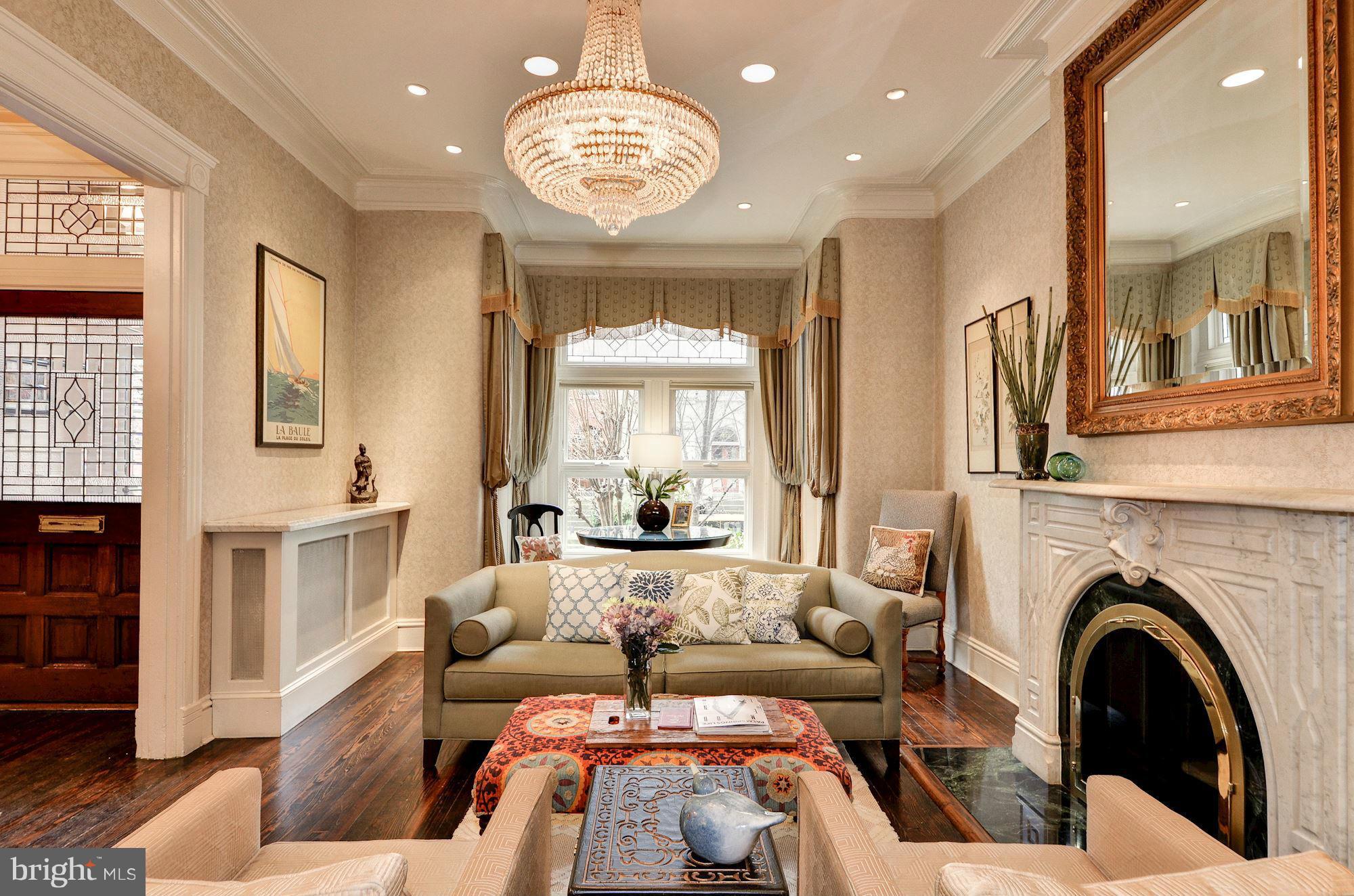 1733 Q Street Northwest Washington, DC 20009 - Photo 4 of 15 a living room with furniture and a large window