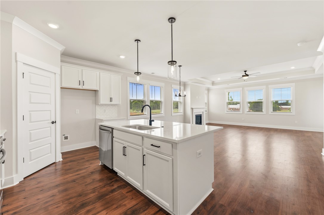 310 Bluestem Court Anderson, SC 29621 - Photo 36 of 36 An open concept floorplan seamlessly connects the kitchen and living area, perfect for entertaining.