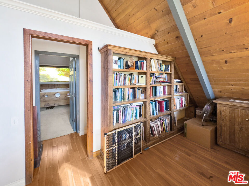 22012 Topanga School Road Topanga, CA 90290 - Photo 11 of 34 a view of a hallway with wooden floor and entryway