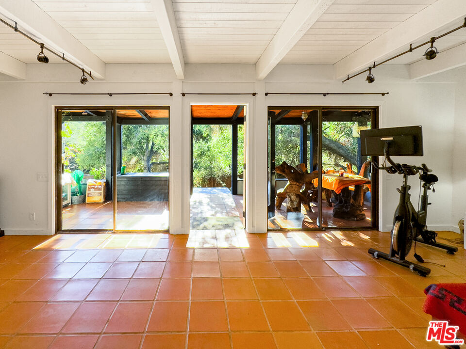 22012 Topanga School Road Topanga, CA 90290 - Photo 24 of 34 a view of a room with gym equipment