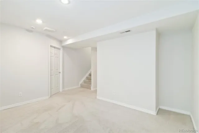 a bathroom with a sink vanity and a mirror