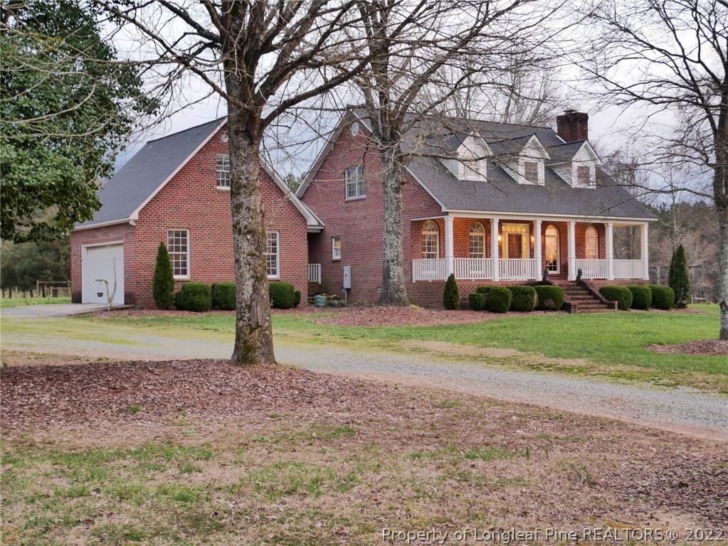 2035 North Moore Road Robbins, NC 27325 - Photo 3 of 16 a house view with a backyard space