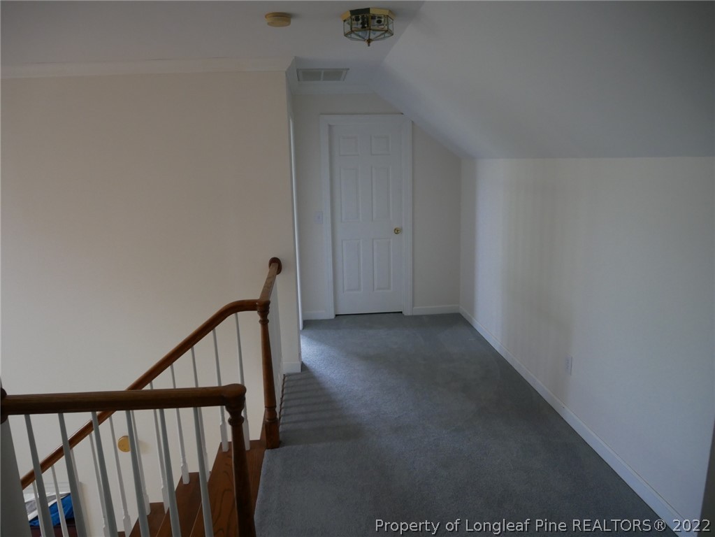 2035 North Moore Road Robbins, NC 27325 - Photo 10 of 16 a view of staircase with railing and white walls
