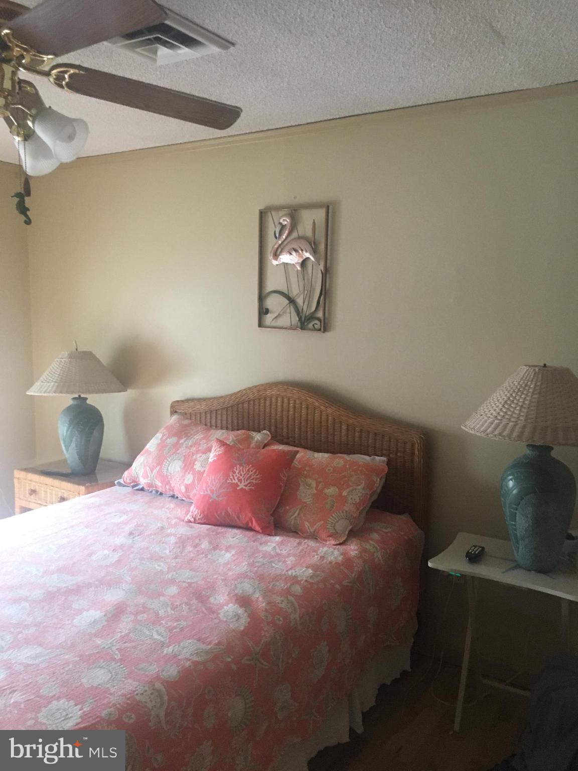 10600 Point Lookout Road Ocean City, MD 21842 - Photo 27 of 89 Bedroom 1 downstairs, back with slider to deck