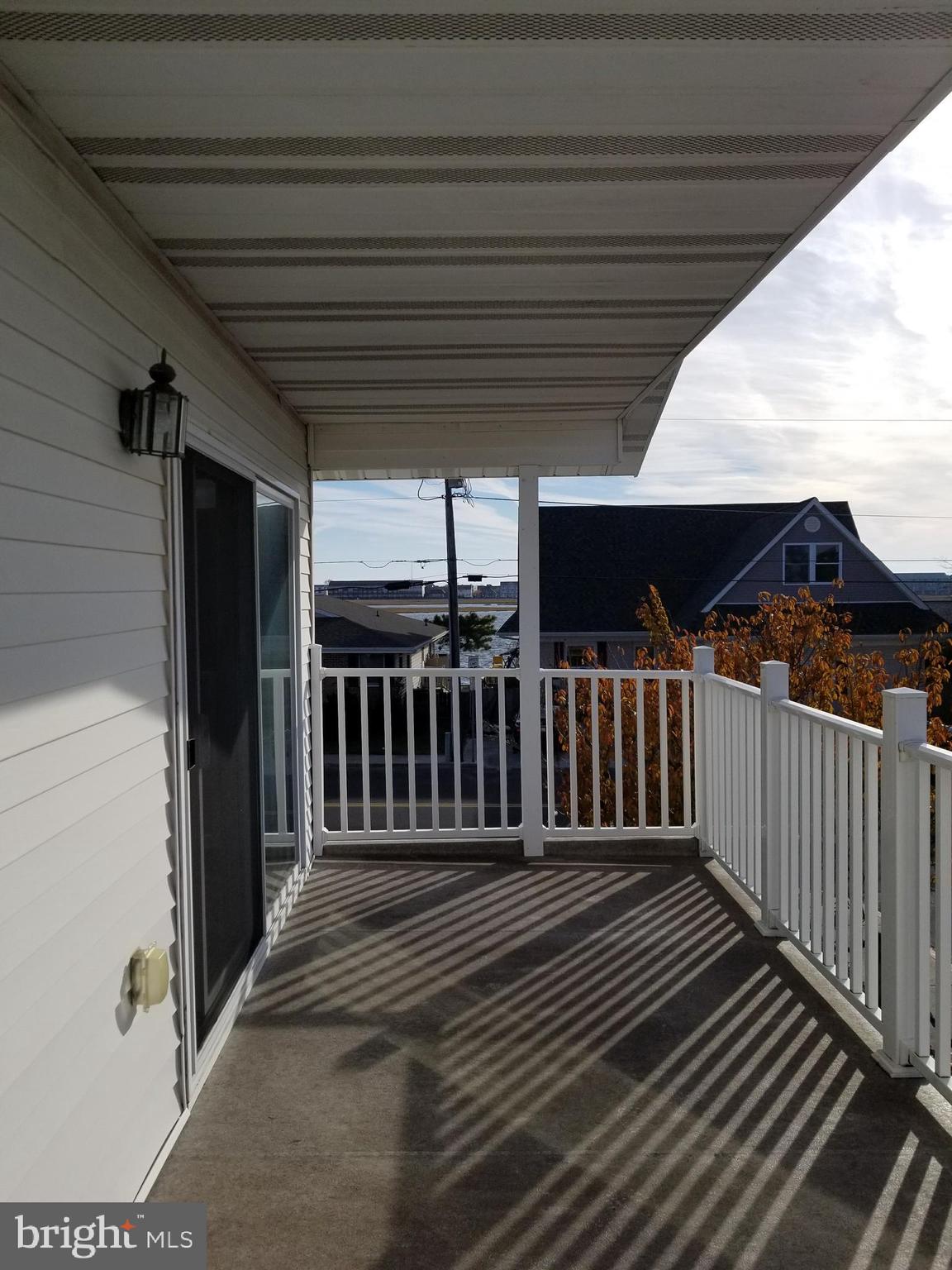 10600 Point Lookout Road Ocean City, MD 21842 - Photo 40 of 89 Upper deck front leading to wrap around deck