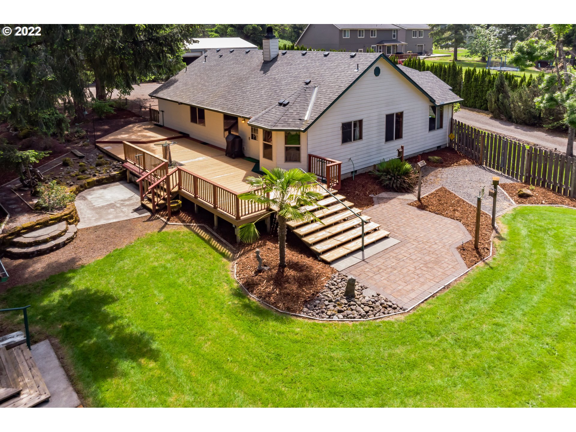 12251 Southeast Winston Road Damascus, OR 97089 - Photo 18 of 32 a aerial view of a house with a yard patio and deck