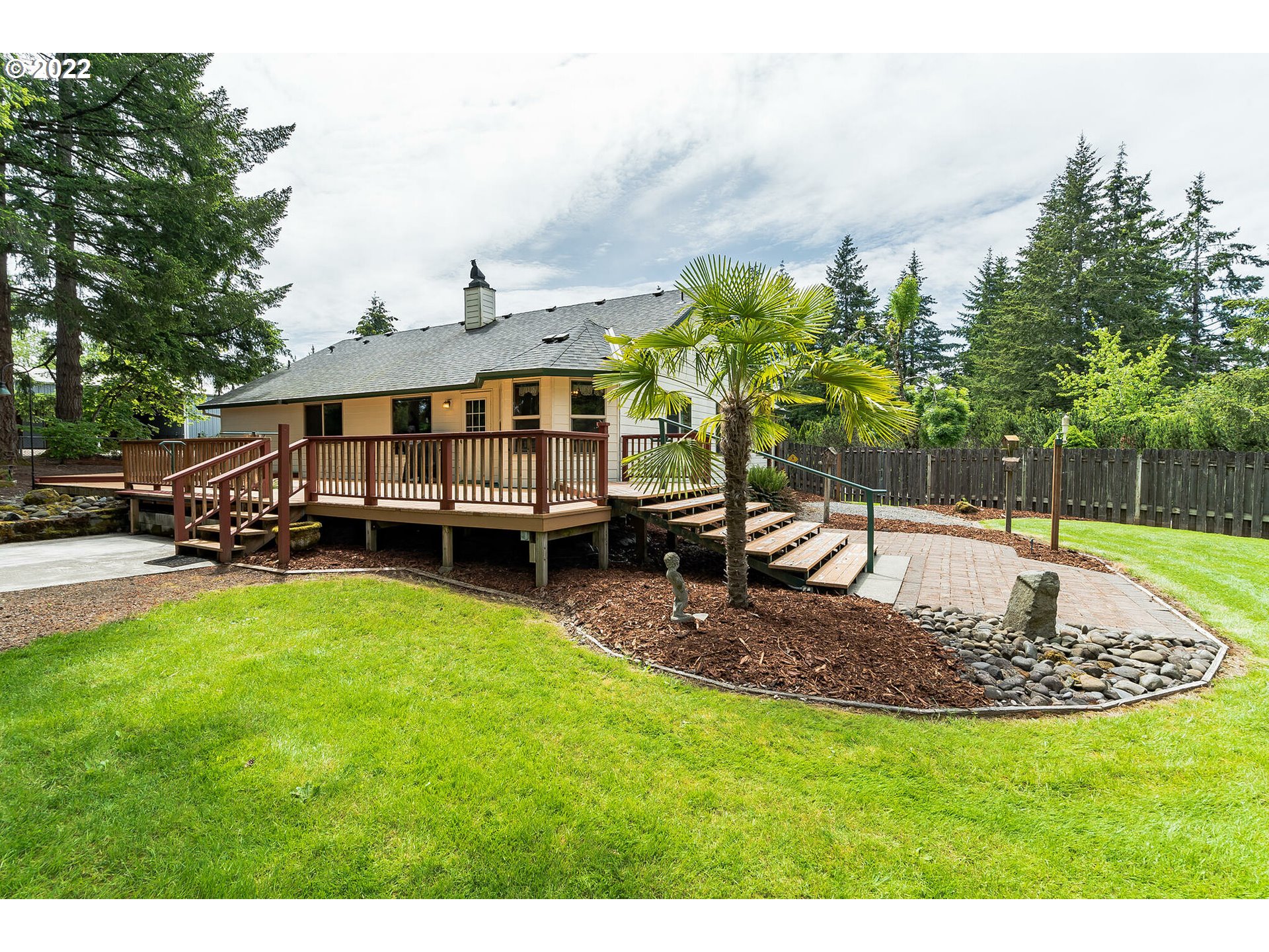 12251 Southeast Winston Road Damascus, OR 97089 - Photo 19 of 32 a swimming pool with outdoor seating and yard