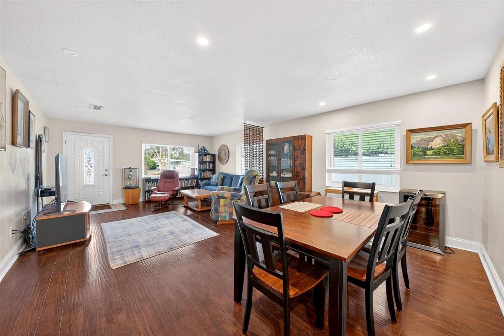 1024 Timor Avenue Orlando, FL 32804 - Photo 12 of 51 a dining room with furniture and wooden floor