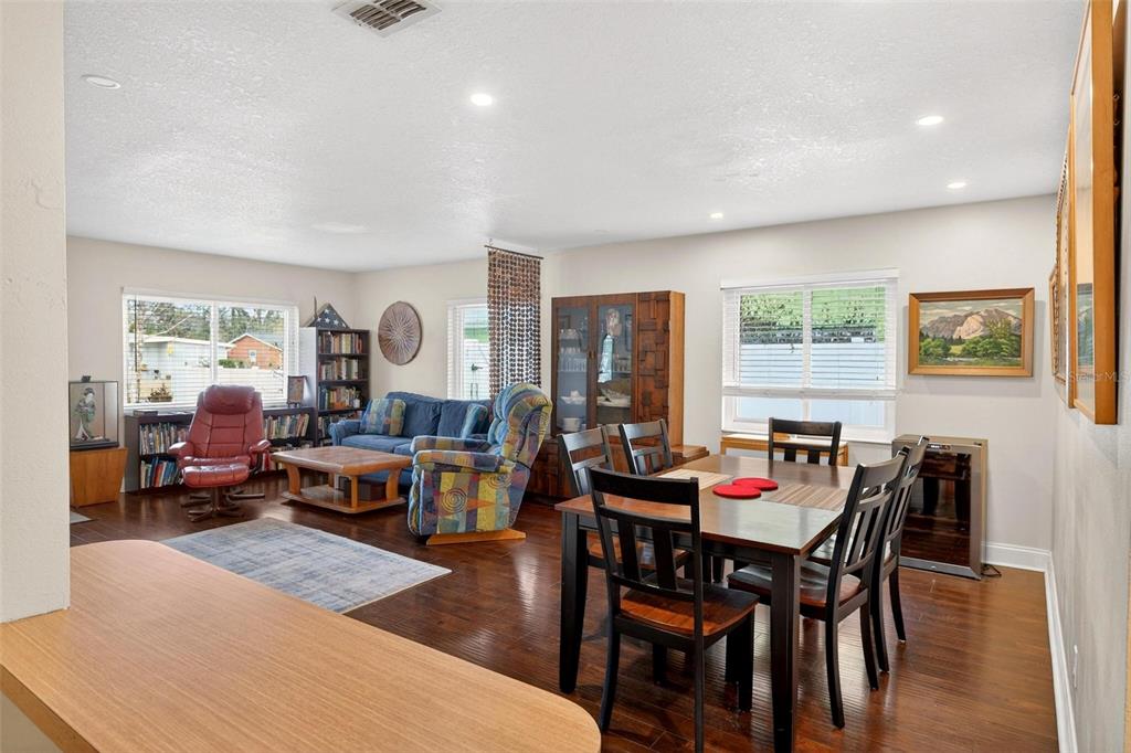 1024 Timor Avenue Orlando, FL 32804 - Photo 17 of 51 a dining room with furniture and wooden floor