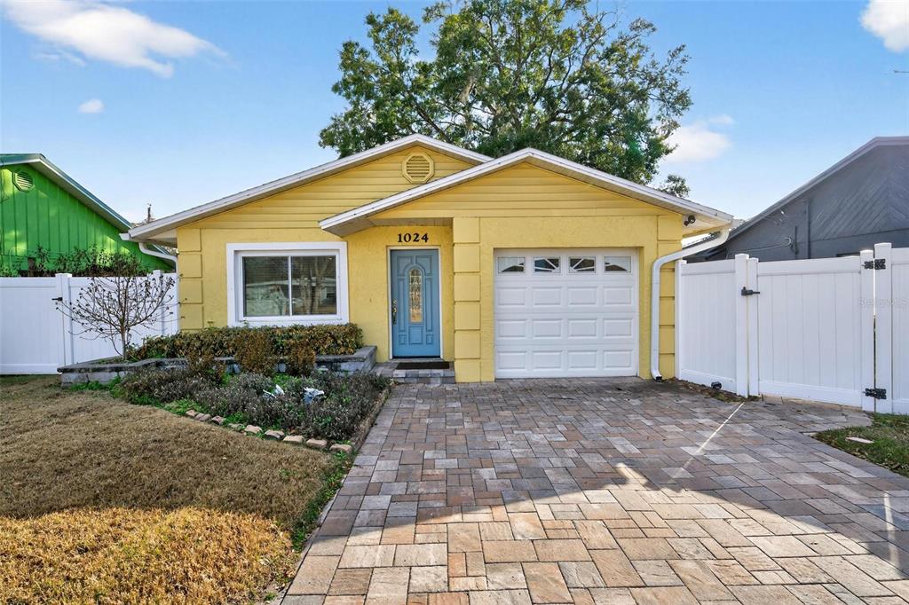 1024 Timor Avenue Orlando, FL 32804 - Photo 2 of 51 a view of backyard of house and car parked