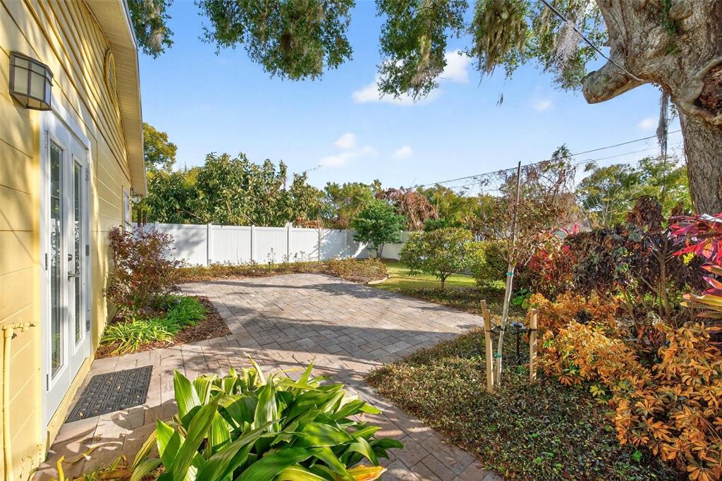 1024 Timor Avenue Orlando, FL 32804 - Photo 35 of 51 a view of a back yard with flower plants