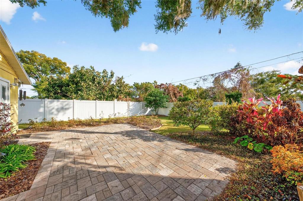 1024 Timor Avenue Orlando, FL 32804 - Photo 36 of 51 a view of a yard with flower plants