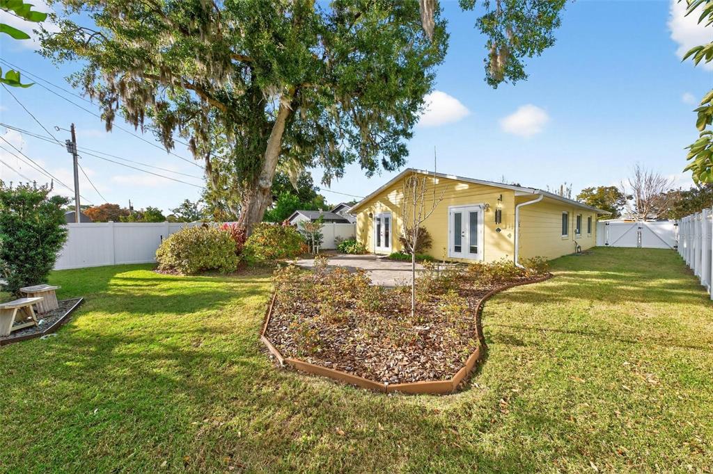 1024 Timor Avenue Orlando, FL 32804 - Photo 39 of 51 a view of a house with a yard