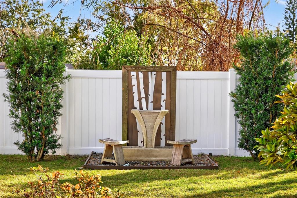 1024 Timor Avenue Orlando, FL 32804 - Photo 42 of 51 a view of a house with a yard potted plant and a large tree