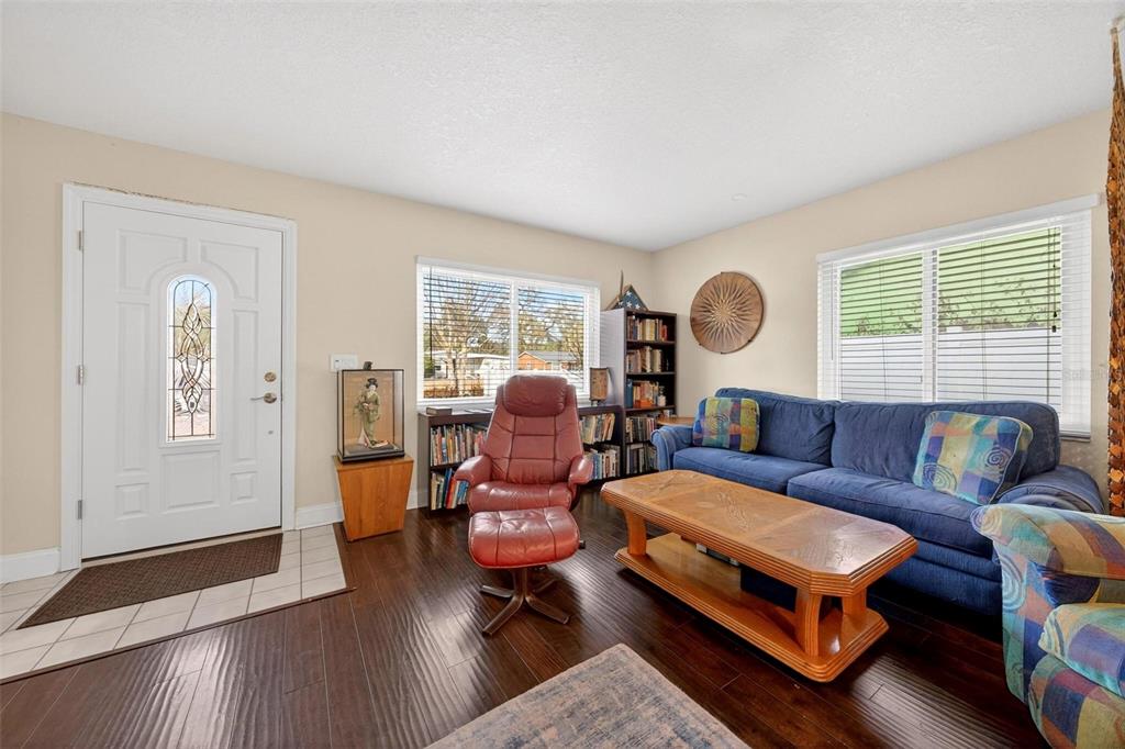 1024 Timor Avenue Orlando, FL 32804 - Photo 8 of 51 a living room with furniture wooden floor and window